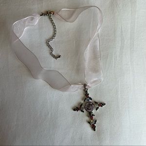 Jeweled cross necklace with pink ribbon